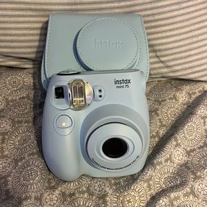 Baby blue polaroid camera